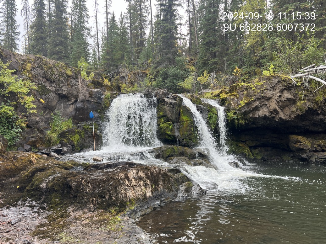 Buck Falls – The downstream most feature is a ~2m high drop with a ~30% gradient extending over a 5 m length. A 2m tall net is included for scale.